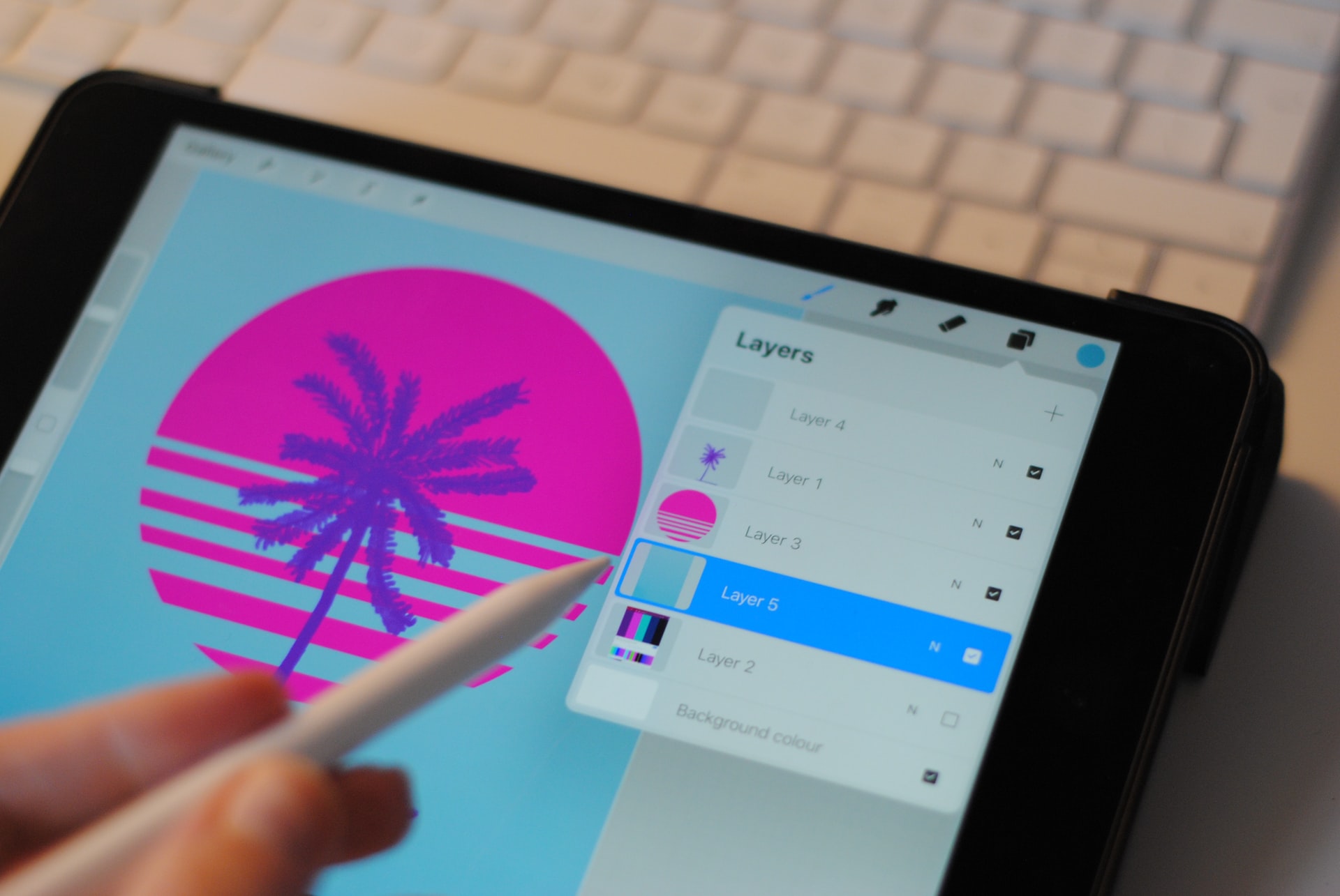 Graphic Design of palm trees on an iPad.