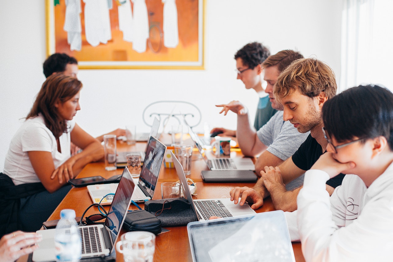 Creative Collaboration session in an office with seven people.