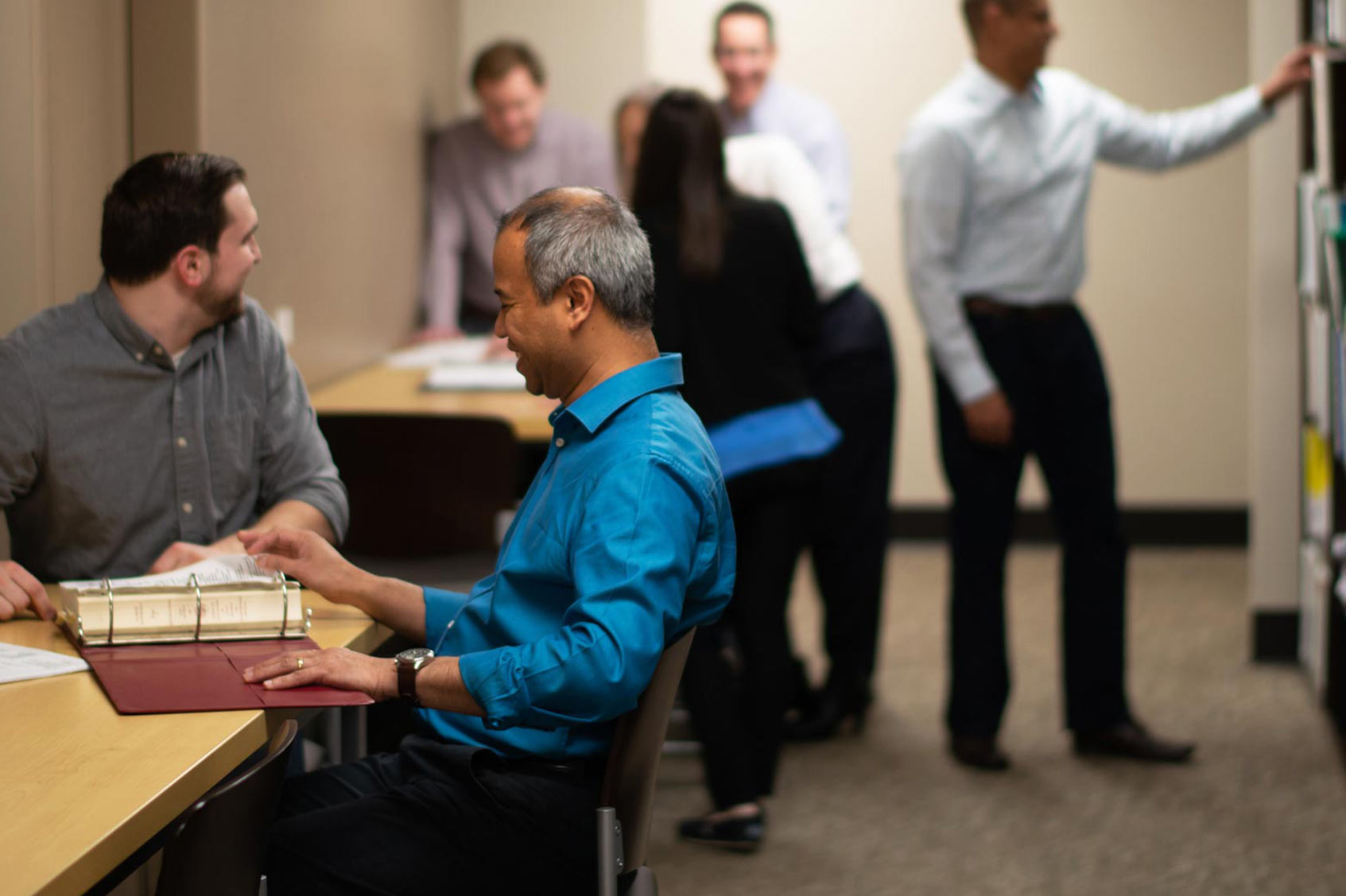 People talking in an office.