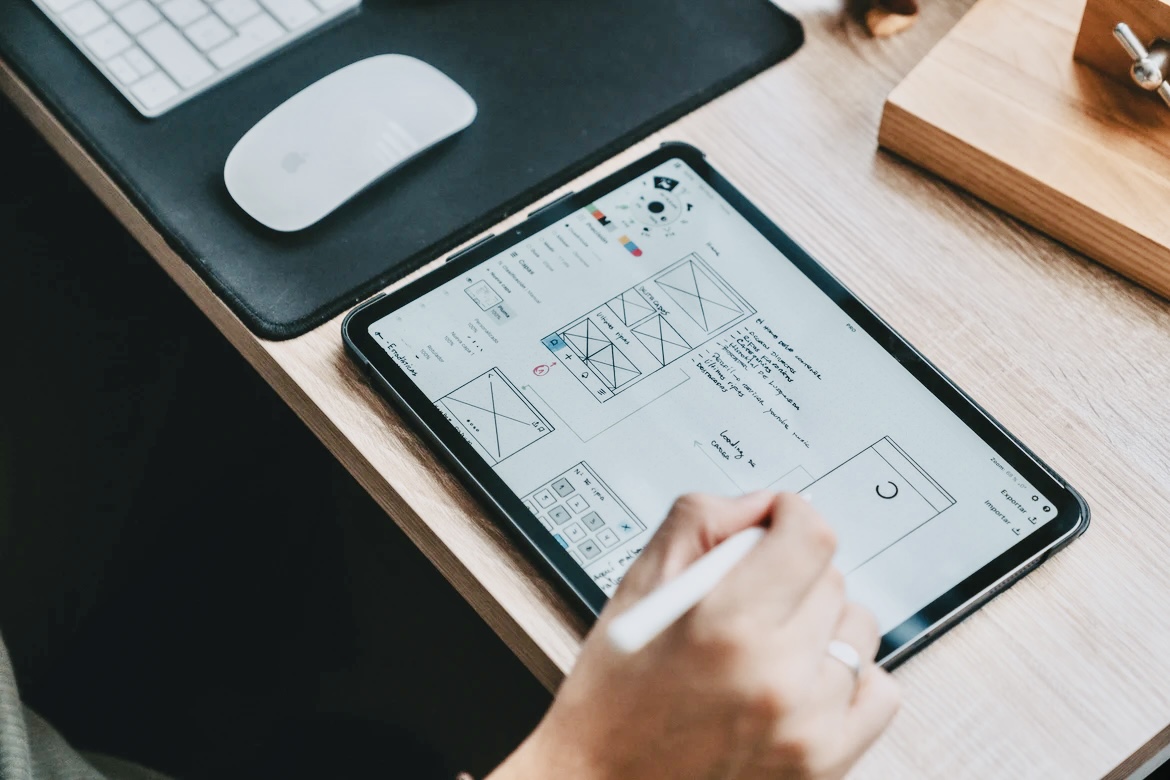 Person doing wireframes on iPad