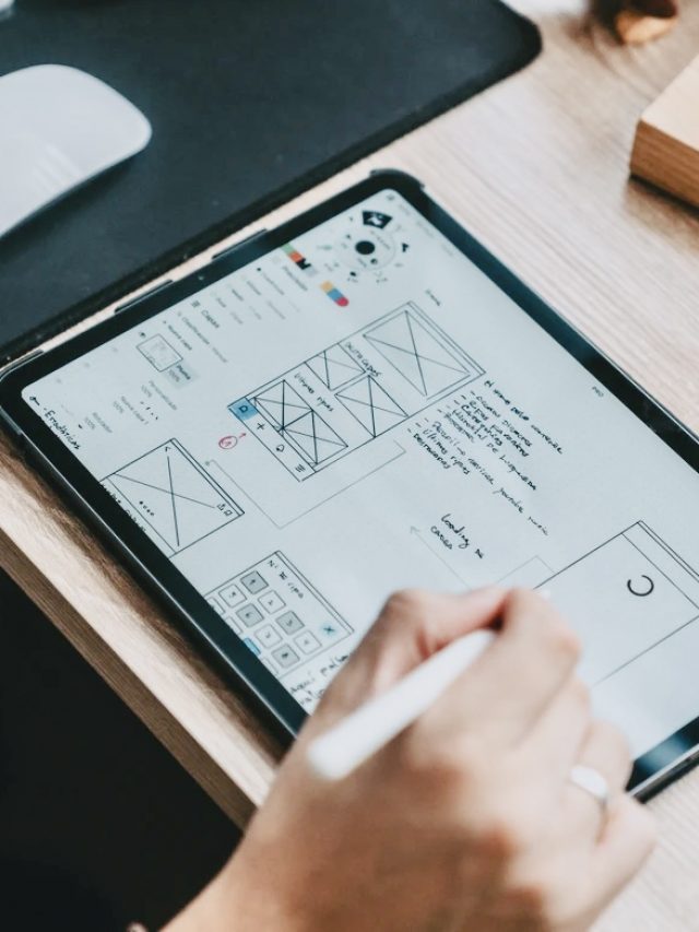 A person creating wireframes on an iPad.