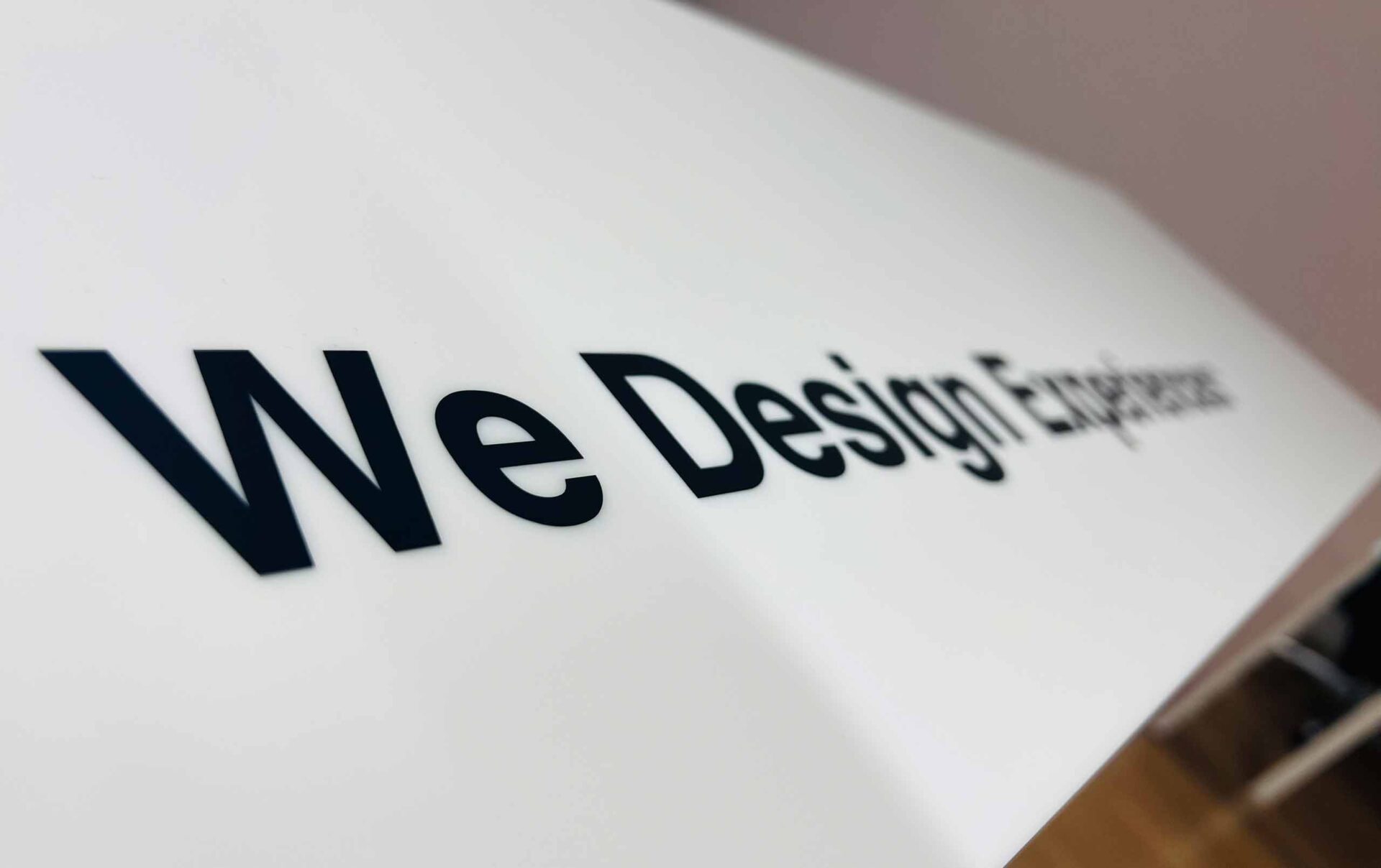 ArtVersion banner reading, "We Design Experiences" 