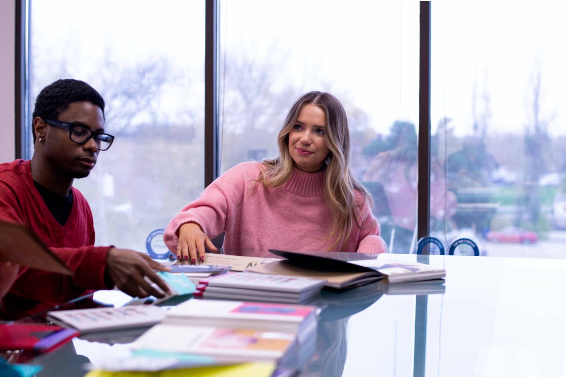 A creative agency design team collaborating in the office.