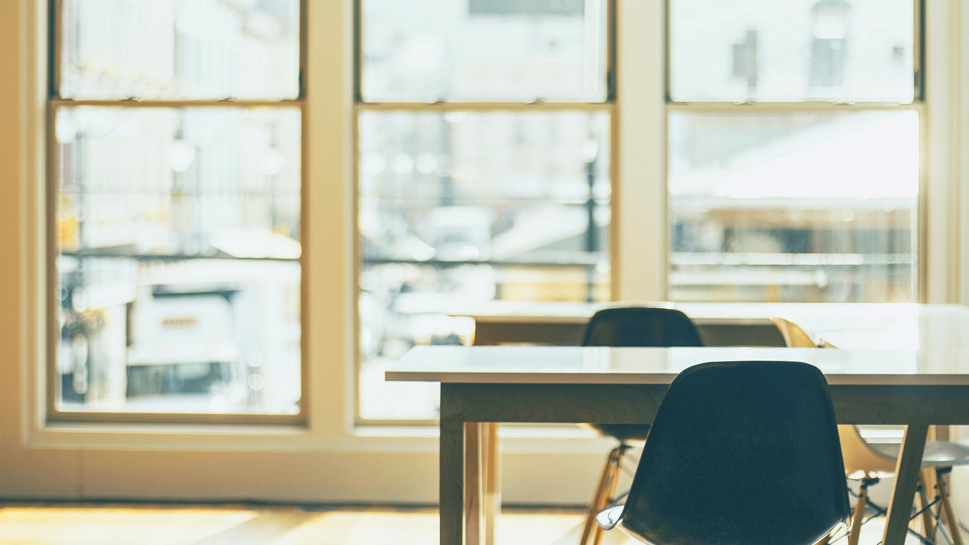 Bright warm office workplace setting.