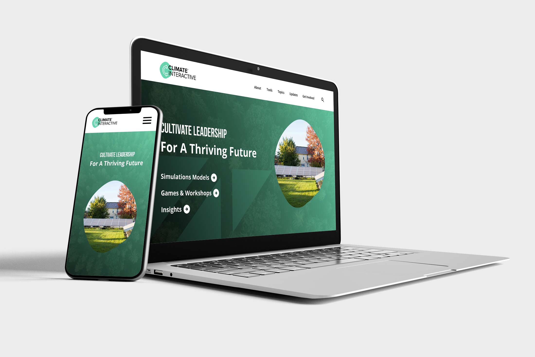 A laptop and phone with a UI design for a website homepage.