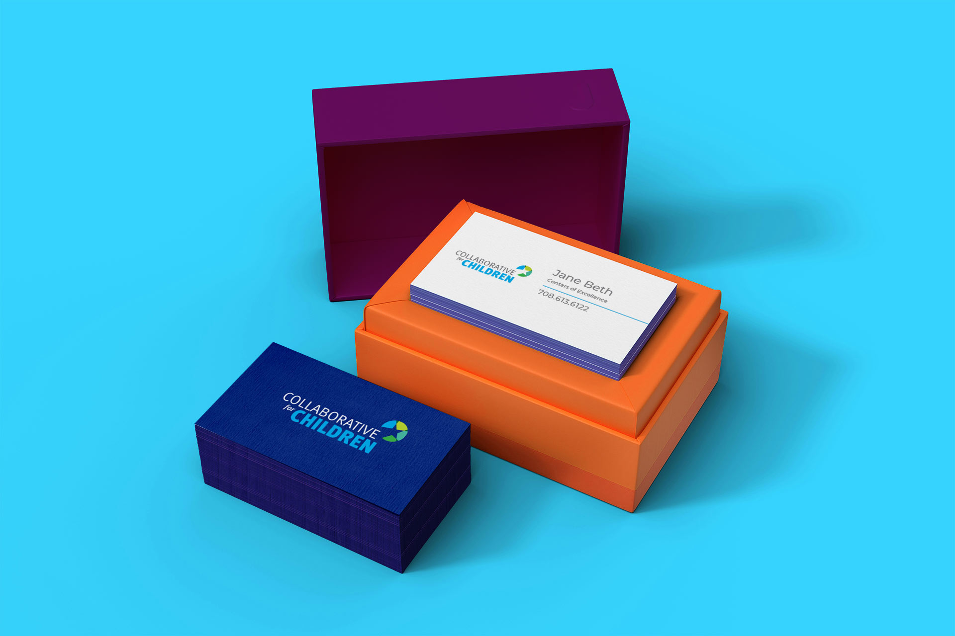 The clients logo appears on a stack of blue business cards.