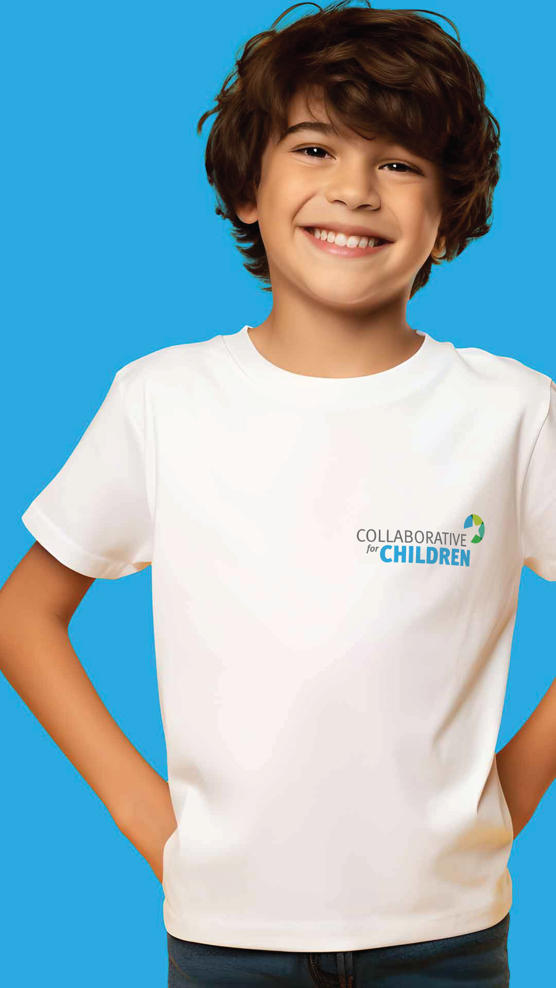 A kid smiles with client logo on t-shirt.