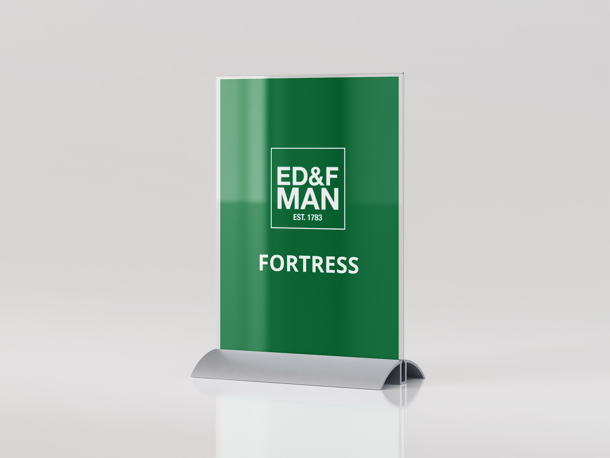 A green desk sign with a logo being displayed.