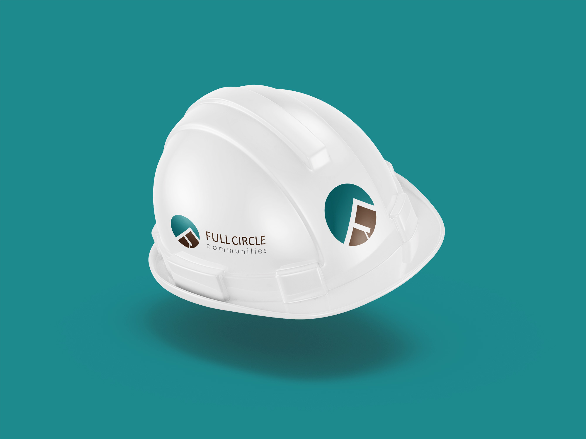 A white hard hat with a logo on the front and the side of it.