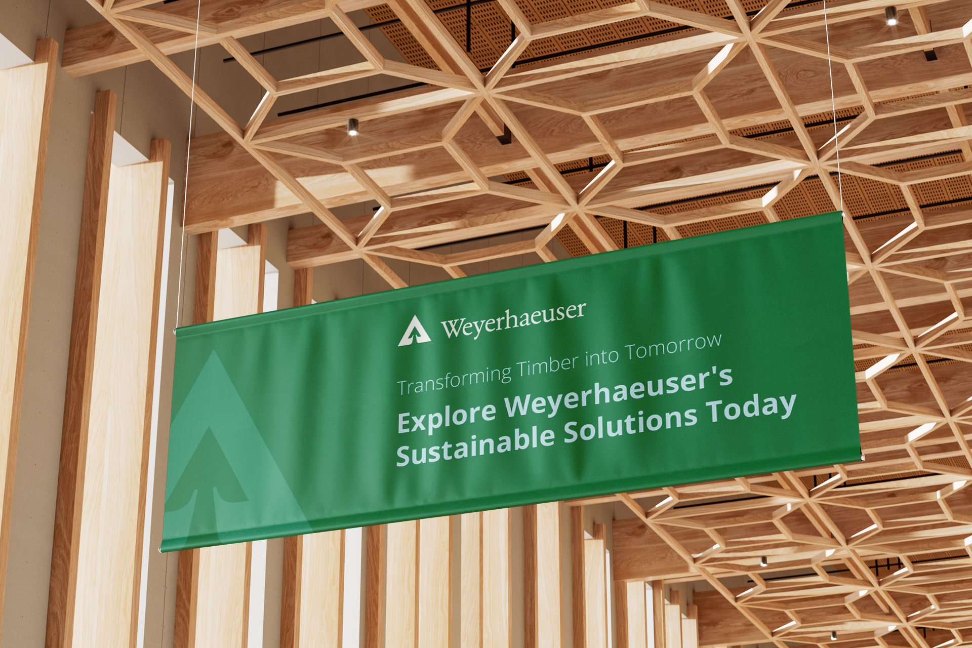 A green ceiling hanging banner for a timber and sustainable forestry manufacturing company.