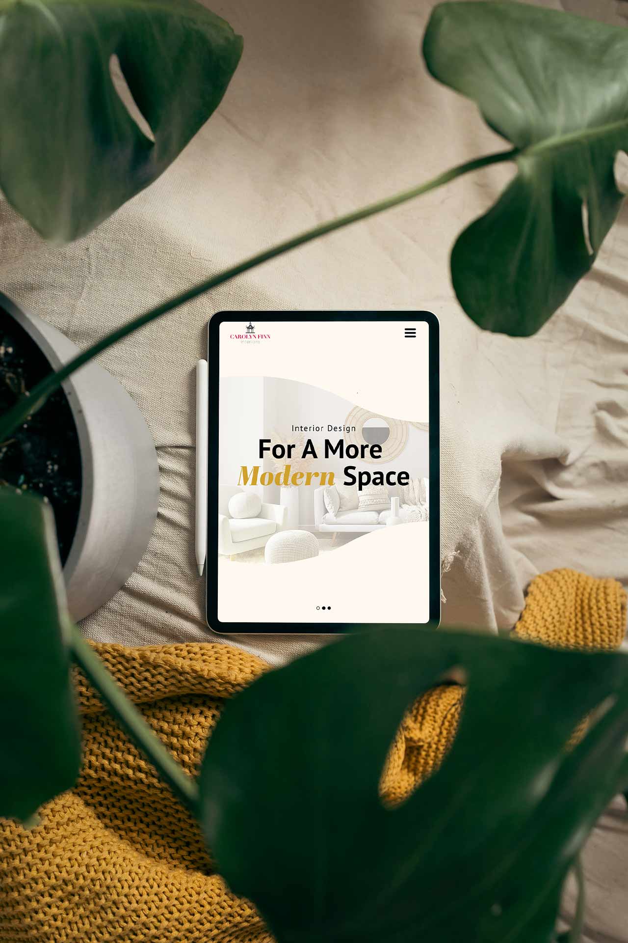 A home page UI for tablet display on a sofa by a plant.