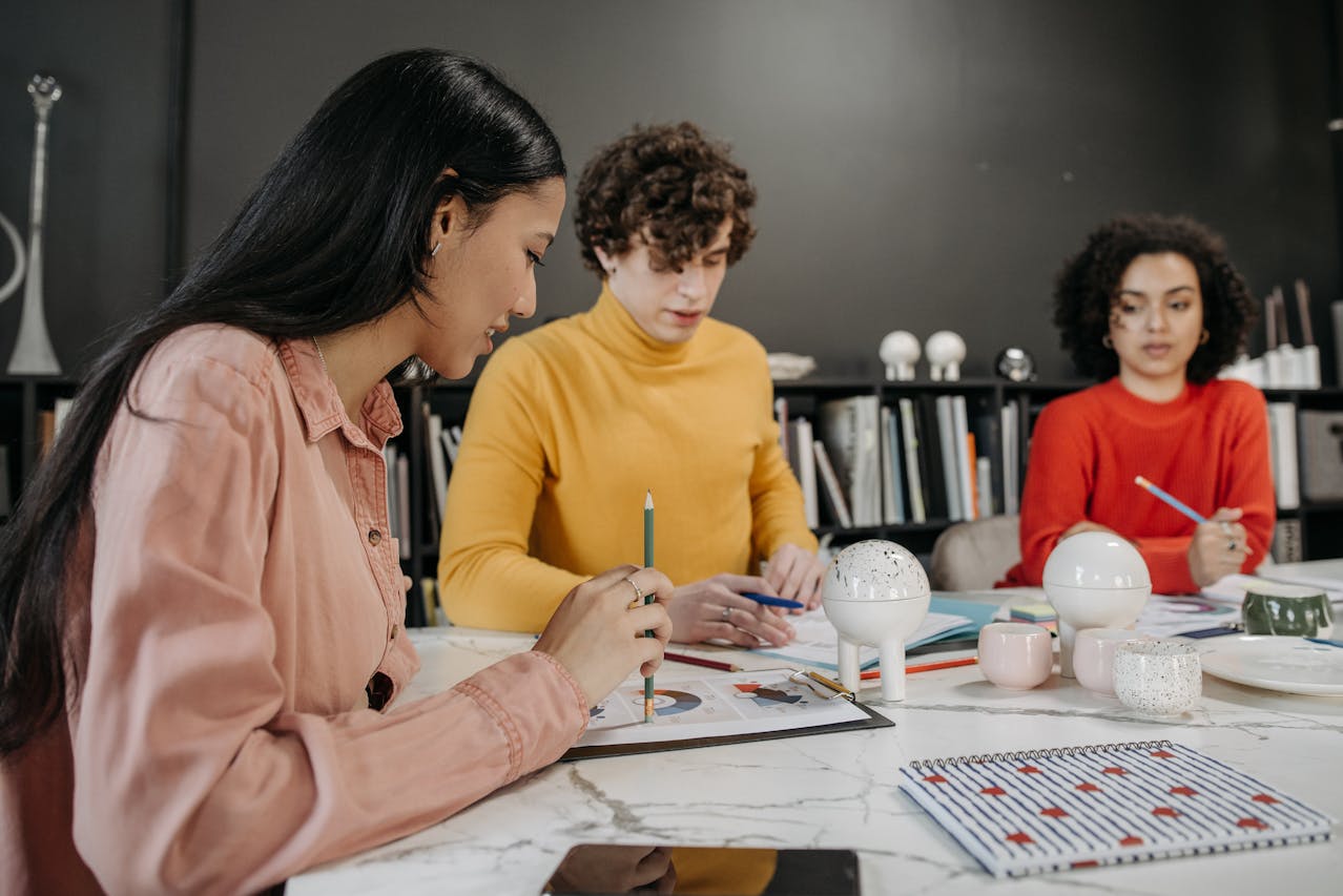 Creative agency team collaborate at a conference office.