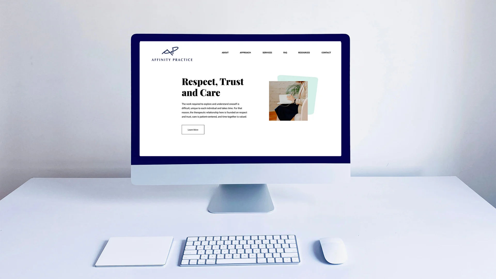 A desktop display featuring a web design that reads "Respect, Trust, and Care".